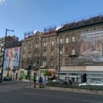 Abandoned buildings turned into ad billboards often line the streets.