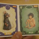 Two playing cards are also included