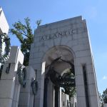 Sculpture of American bald eagles setting laurel wreaths over the victory medallion in the floor
