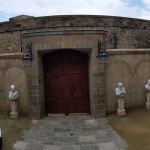 The busts in the back of the mansion depict the key actors in the international trade of goods.